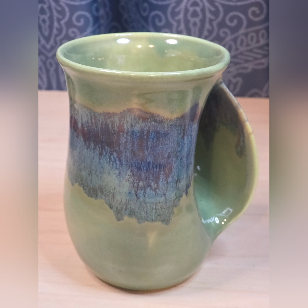 Neher Pottery Handwarmer mug. Right handed dated 2011 and signed / 16oz